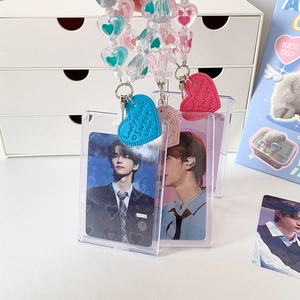 Beaded heart keychain with transparent acrylic photocard holder in blue, pink and red colors