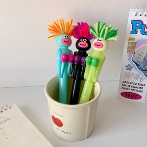 Funny cartoon punching pens with colorful hair in a ceramic cup for office stationery