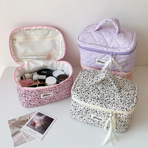 Three-piece quilted ink splash makeup bag set with large capacity and ribbon zippers