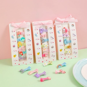 Eenhoorn regenboog haarspeldjes set voor meisjes op een maandag-zondag cadeau display kaart