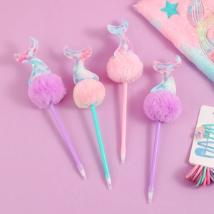Detail of mermaid ballpoint pens with glitter fish tails and soft faux fur pom poms