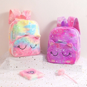 Rainbow plush unicorn backpack set with silver star patterns and matching notebook