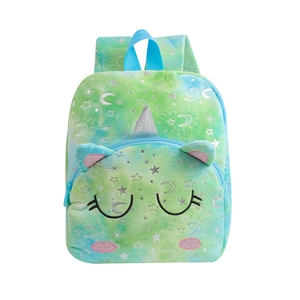 Detail of plush unicorn backpack with tie-dye fabric and silver foil star patterns