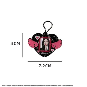 Detail of angel wing heart photo keychain with dimensions 7.2x5cm for ID pictures