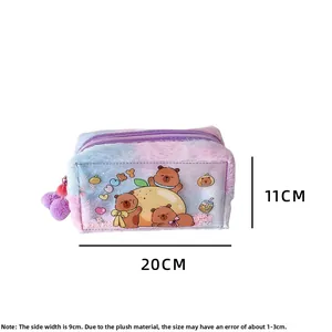 Detail view of the plush makeup bag showing the blue-purple gradient and lucky bear design