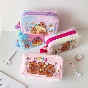 Close-up of plush sequin pencil cases with clear PVC window and cute bear patterns