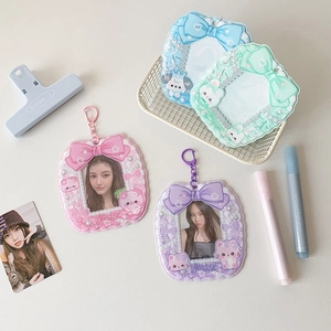 Detail of 3-inch hollow photo card holders with lace edges, pearls, and cute bow accents