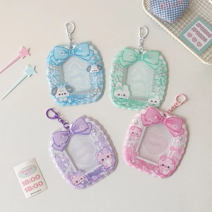 Cute cartoon animal card holders in pastel blue, green, purple and pink with bow details