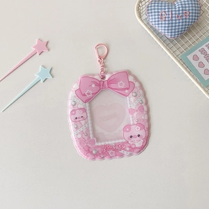 Pink cartoon card holder featuring a heart-shaped window and cute 3D bow design