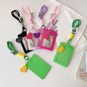 Vertical lanyard card holder with heart charm and transparent window in multiple colors