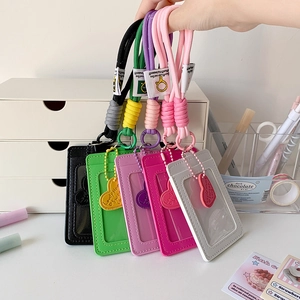 Vertical leather ID card holders with thick woven lanyards and heart pendants in 5 colors