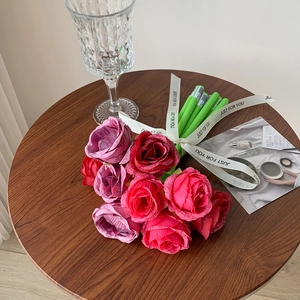 Close-up of artificial rose pens with realistic fabric petals and Just For You silk ribbon