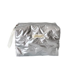 Quilted silver butterfly cosmetic bag with metallic finish and zipper closure