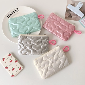 Quilted heart embossed makeup pouch with zipper closure in mint, pink, silver and cream