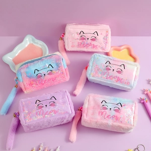 Detailed display of assorted plush cat pencil cases with sequins and fluffy tail charms