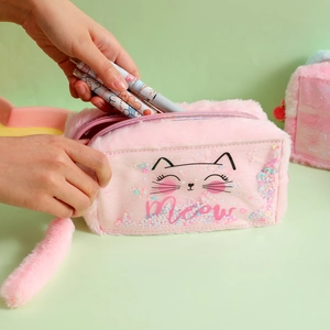 Detail of pink plush cat pouch with floating glitter sequins and cat face embroidery