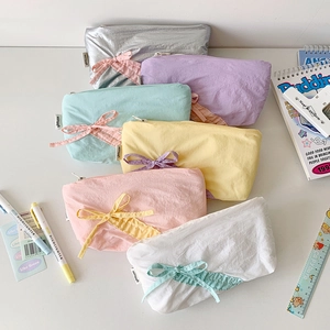 Pastel soft fabric pencil cases with cute bowknot in various bright candy colors