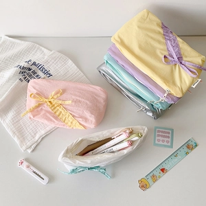 Large capacity drawstring pencil case in pastel colors with cute bow ribbon decoration