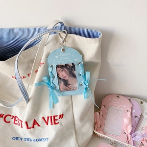 Light blue PU leather photocard holder with ribbon bow and silver carabiner clip
