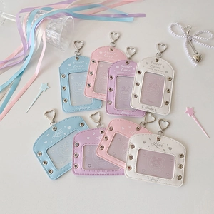 Pastel faux leather card holders with heart clasps and metal eyelets in multiple colors