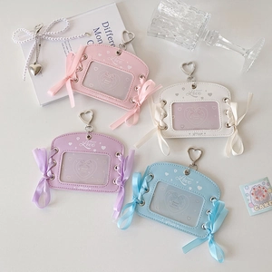 Pastel ribbon bow card holders in four colors with heart-shaped metal hooks and PU leather