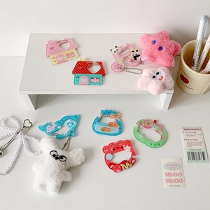 Collection of cute acrylic and plush house and animal charms with colorful clips