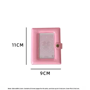 Detail of pink star embossed mini photo album with clear window and metal snap closure