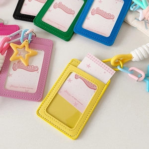 Colorful leather ID card holders with star charms and woven lanyards in five vibrant colors