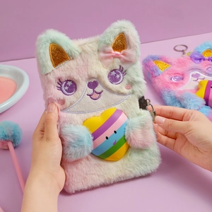 Close-up of A5 plush cat diary with rainbow heart and silver padlock held by hands