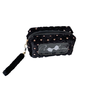 Plush black makeup bag with pink hearts, perfume window and fluffy tail charm