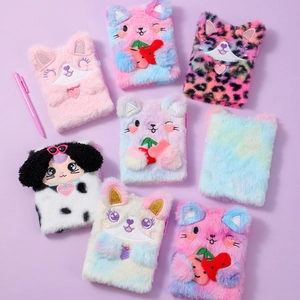 Detail of plush animal notebooks featuring cats and dogs with colorful faux fur textures