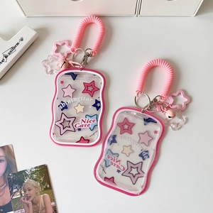 Detail of pink shiningstar PVC card holder with star patterns and spring lanyard