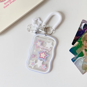 Detail of light purple star photo card holder with white spiral lanyard and star charms