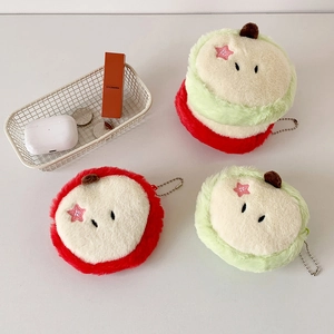 Close-up of cute plush fruit coin purses with star embroidery and metal chain strap