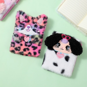 Detail of plush cat and dog notebooks with soft faux fur covers and cute 3D ears