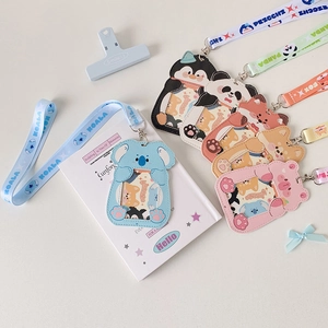 Detail of cute panda and koala card holders with matching patterned lanyards