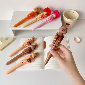 Detail of creative cartoon punching pens with furry hair and bear designs for stress relief