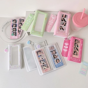 Pastel K-pop photo card binder with butterfly bow pendant and three-inch clear window