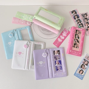 Bow hollow photo album for photocards with matching heart pendants in five pastel colors