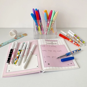 Aesthetic stationery set with macaron-colored pens, acrylic pen holder and notebook