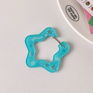 Star-shaped cyan acrylic carabiner keychain with white star patterns and metal clip