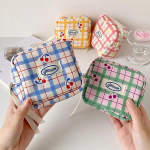 Cute plaid square makeup bag with cherry print and inner compartments for students