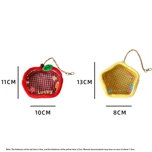Detail showing dimensions of red apple and yellow star plush bags with gold chains