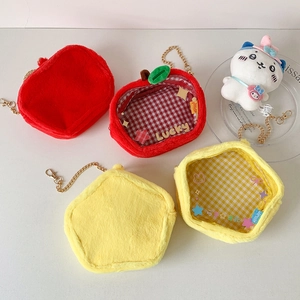 Close-up of plush apple and star coin purses with clear PVC windows and golden chains