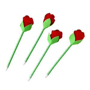 Set of four artificial rose flower ballpoint pens with red velvet petals and green stems