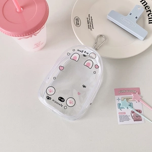 Close-up of clear PVC storage bag with cute rabbit ears and pink heart prints for charms