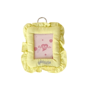 Plush light yellow photo card holder with ruffles and metallic ring for students