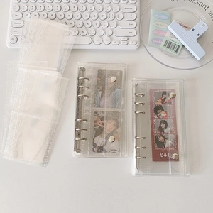 Detailansicht des transparenten Glitzer-PVC-Binders mit silberner 3-Ring-Mechanik und Druckknopf