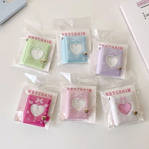 6-piece set of 2-inch heart hollow mini photocard binder keychains in macaron colors