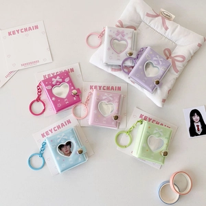 Mini heart-window photo card holders with bow prints in various pastel colors